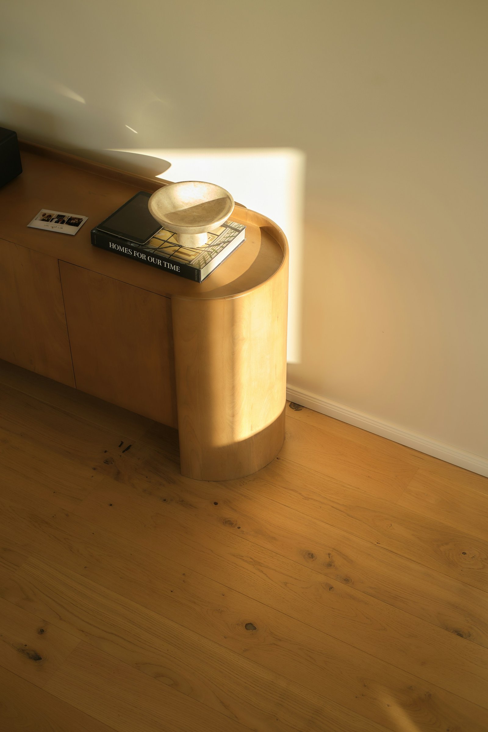 Golden cabinetry and daylight interior detail reference